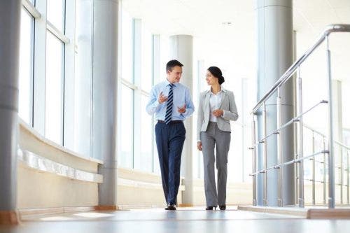 A hospital CFO discussing with her staff.