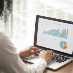 A health informatics analyst preparing a report.