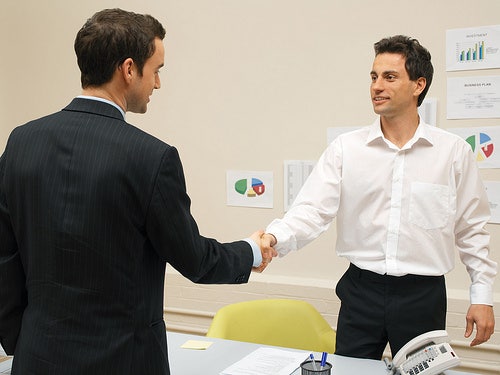 Two people shaking hands