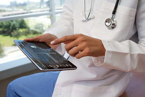 Physician using a tablet
