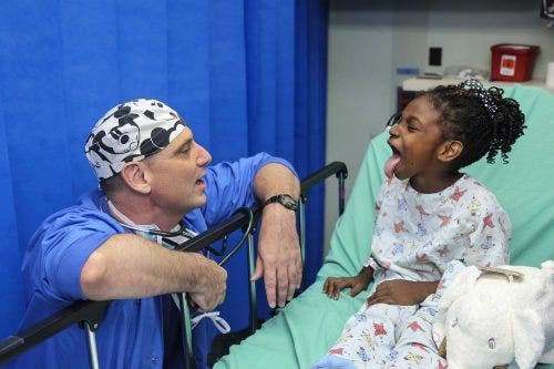 Doctor meets with young patient