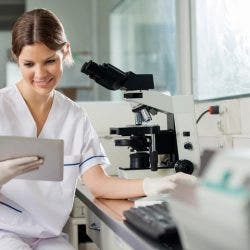 A health information manager reviews an EHR.